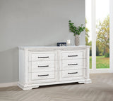 Detailed view of ornate trim and antique bronze drawer pulls