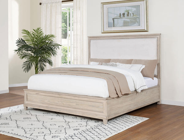 Side angle of Pembroke Eastern King panel bed showing nailhead trim