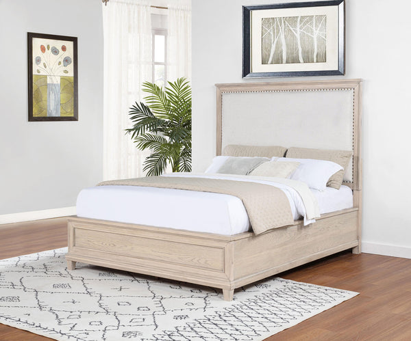 Side view of Pembroke upholstered queen bed in washed oak finish