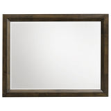 Close-up of beveled mirror edge on Atlas dresser mirror