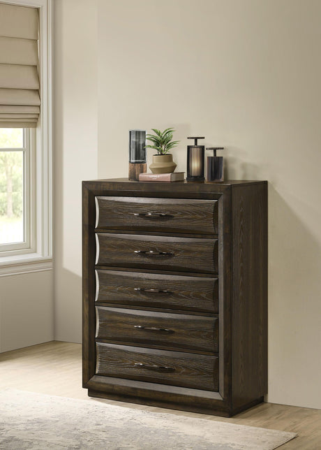 Atlas chest drawer detail showing beveled arched fronts and black nickel pulls