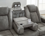 Console and cup holders between reclining seats