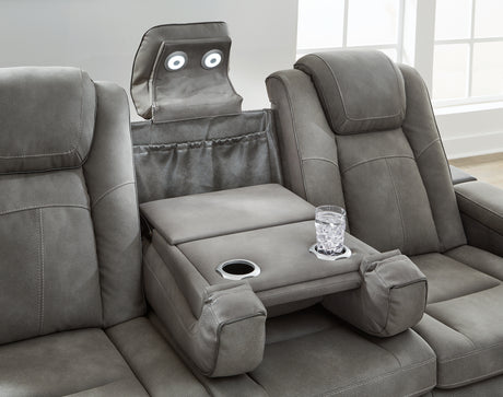 Console and cup holders between reclining seats