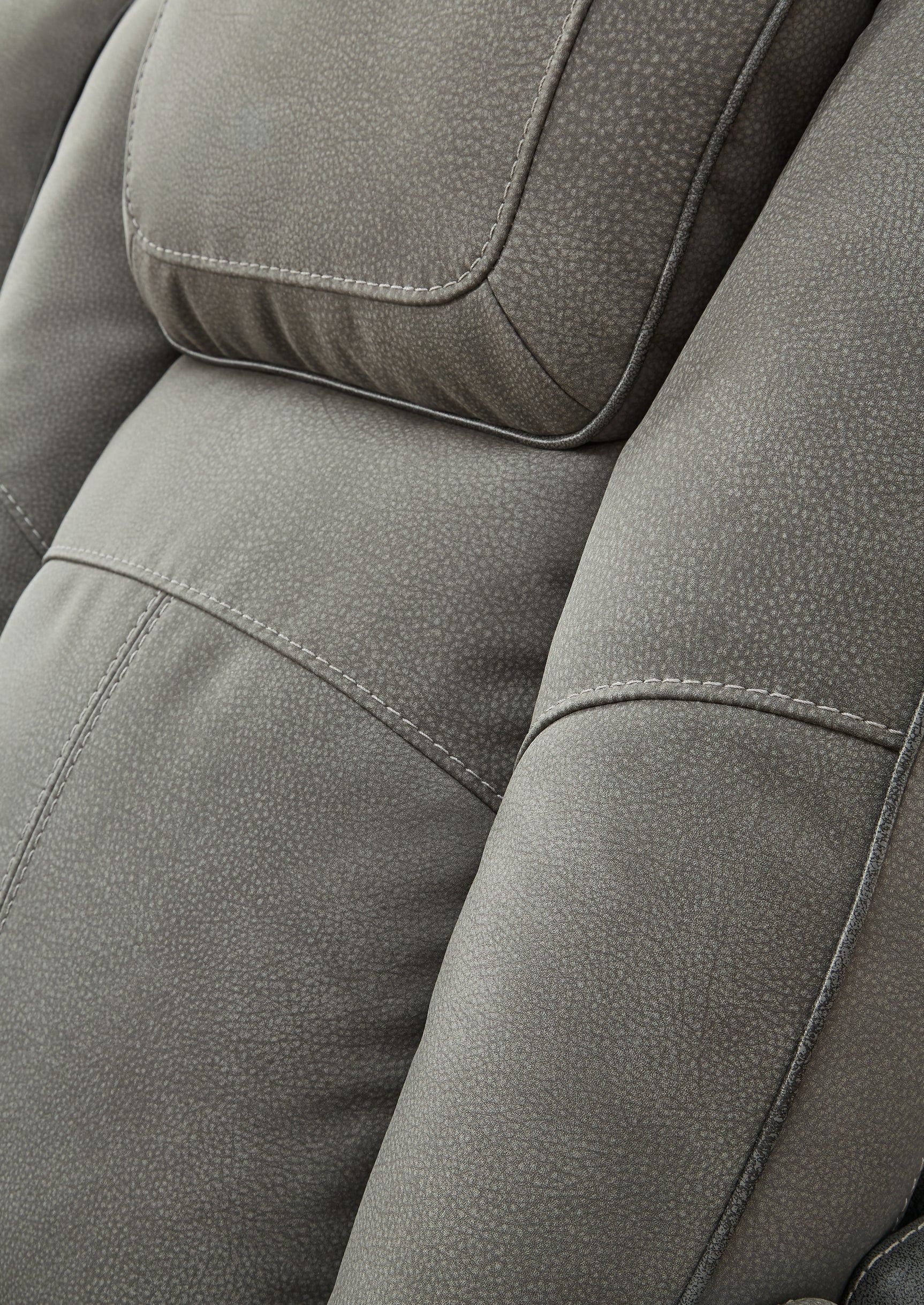 Extended ottoman footrest on sofa