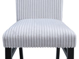 Room view highlighting light gray side chairs in Tracy dining set