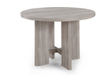 Room view of Amara Drift Wood Round Dining Room Set