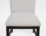 Side chair in room setting with table