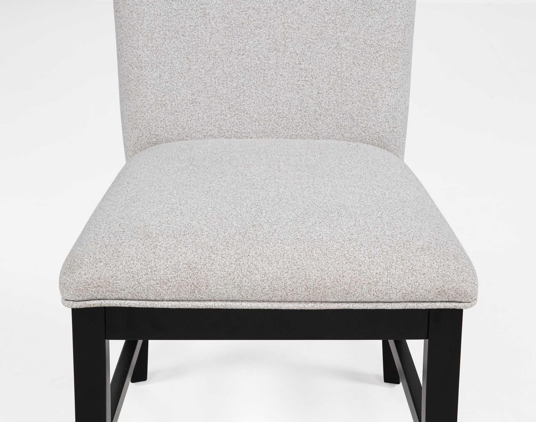 Side chair in room setting with table
