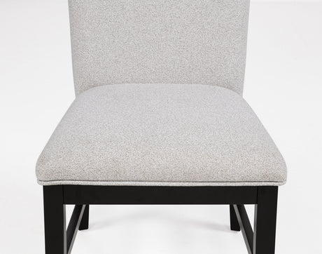 Side chair in room setting with table