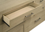Drawer handle detail with light oak finish background