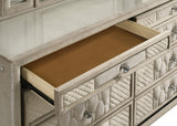 Reflective acrylic accents on drawer fronts