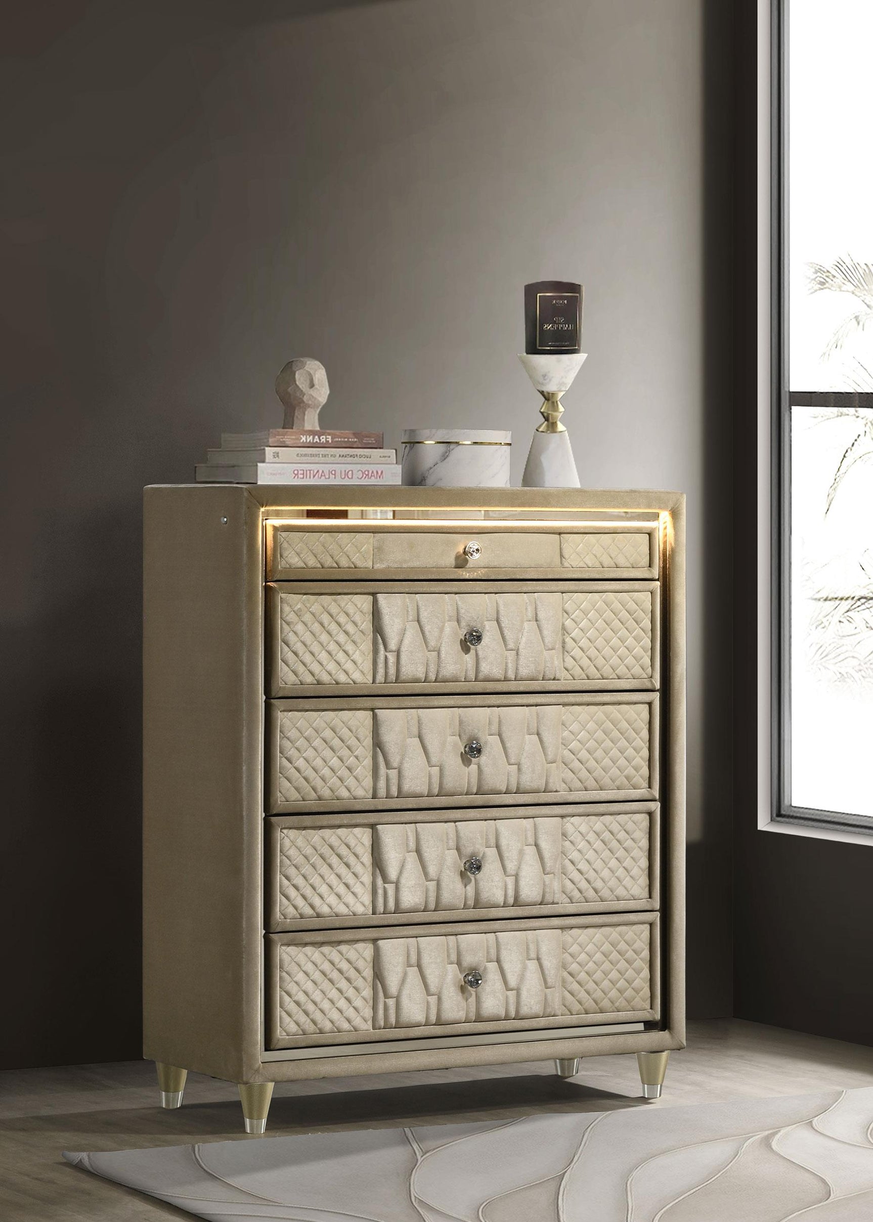 Close-up of top drawer with brown felt lining and crystal knob
