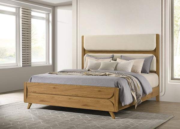 Side angle of Bennett Eastern King Upholstered Panel Bed showing fabric and wood frame