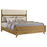 Close-up of padded cream upholstered headboard panels on Bennett bed