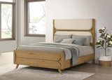 Bennett 62-inch queen upholstered panel bed in cream with light oak frame, front view