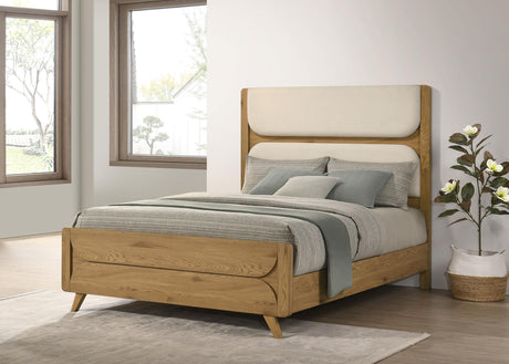 Bennett 62-inch queen upholstered panel bed in cream with light oak frame, front view