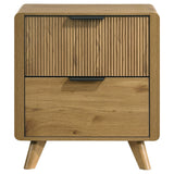 Side angle of Bennett light oak nightstand showing rubberwood legs