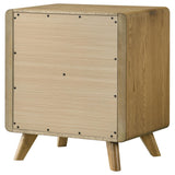 Nightstand placed next to bed in decorated bedroom