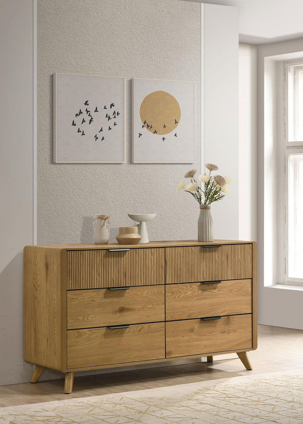 Side angle of Bennett light oak dresser showing drawer detail
