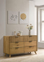 Side angle of Bennett light oak dresser showing drawer detail
