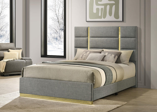 Side view of Ines queen bed showing gold base detail on footboard