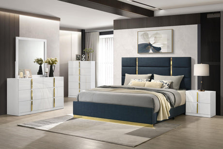 Full view of navy fabric queen bed in styled bedroom