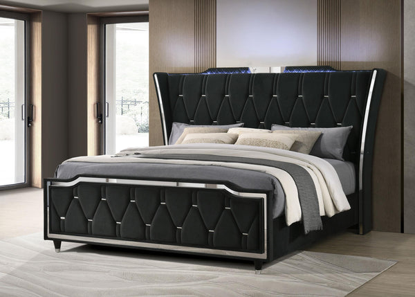 Close-up of button-tufted wingback headboard with LED lighting