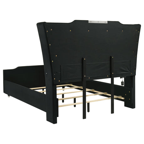Solid rubberwood legs supporting Lorient queen bed frame