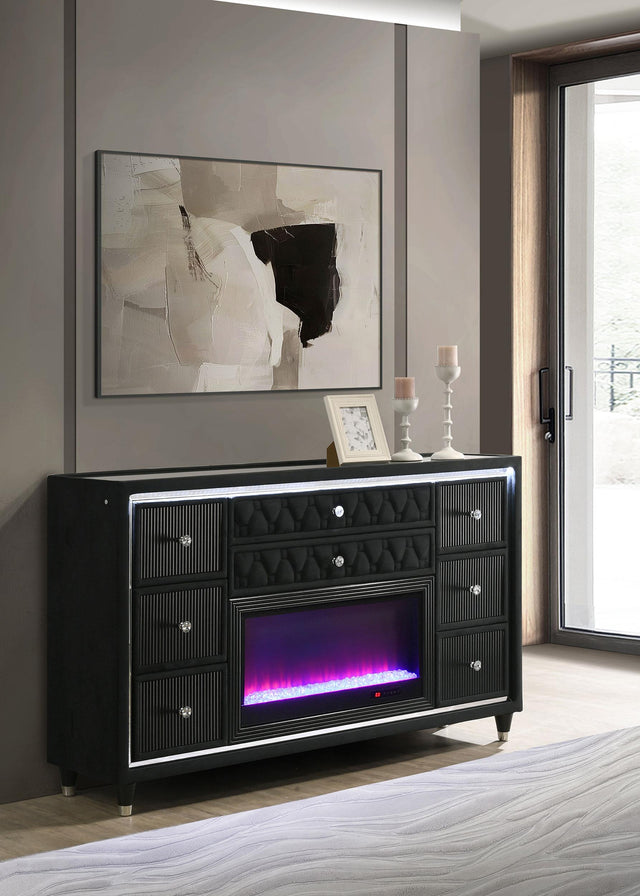 Close-up of LED flame visualizer behind clear tempered glass on dresser