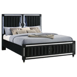 Close-up of black velvet upholstery and LED panel lighting on bed