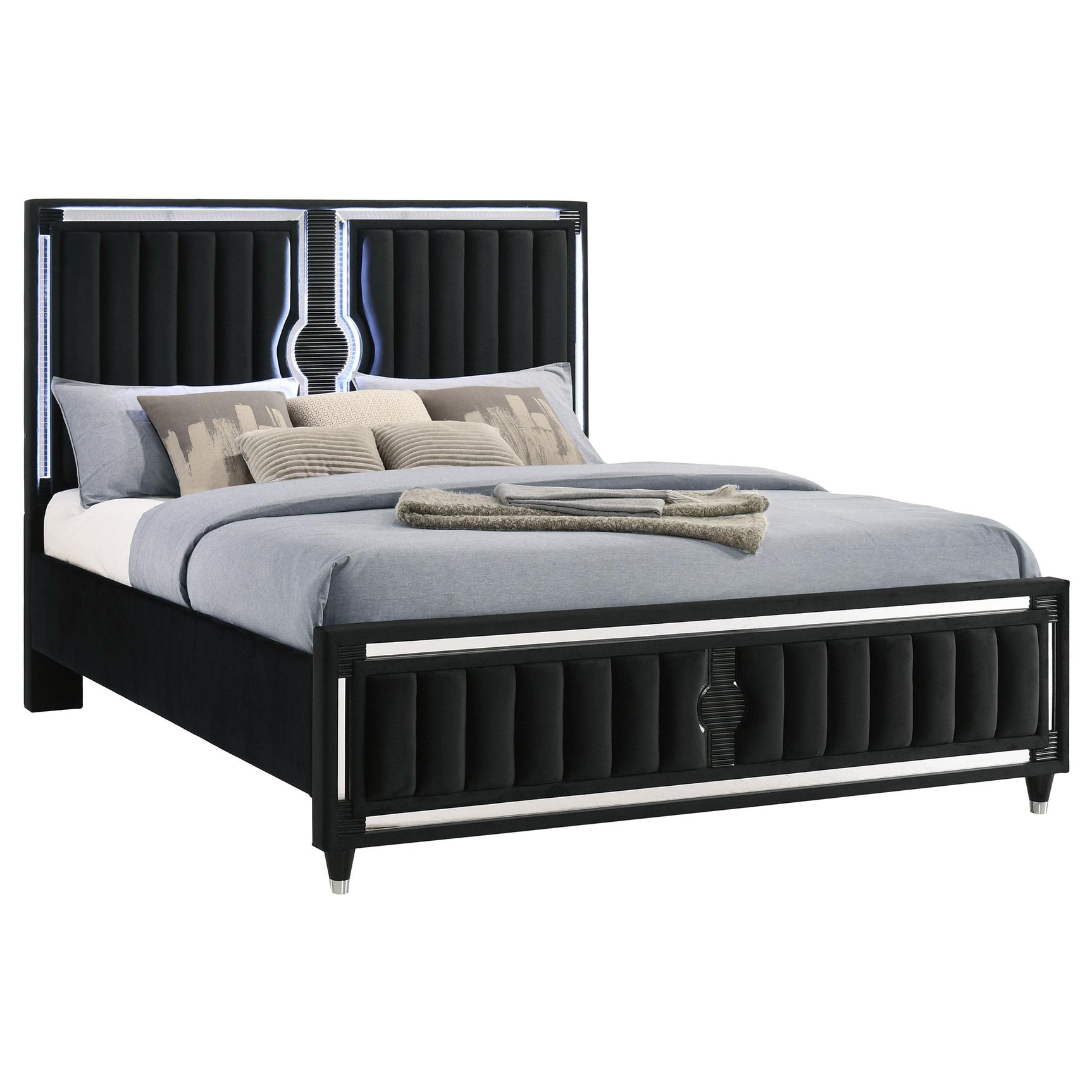Close-up of black velvet upholstery and LED panel lighting on bed
