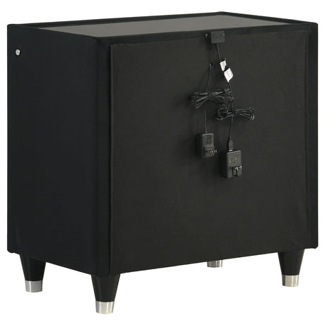 Nightstand with USB ports shown with charging cable connected