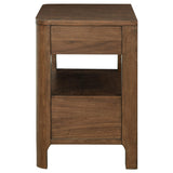 Finger-tip pulls on walnut nightstand drawers