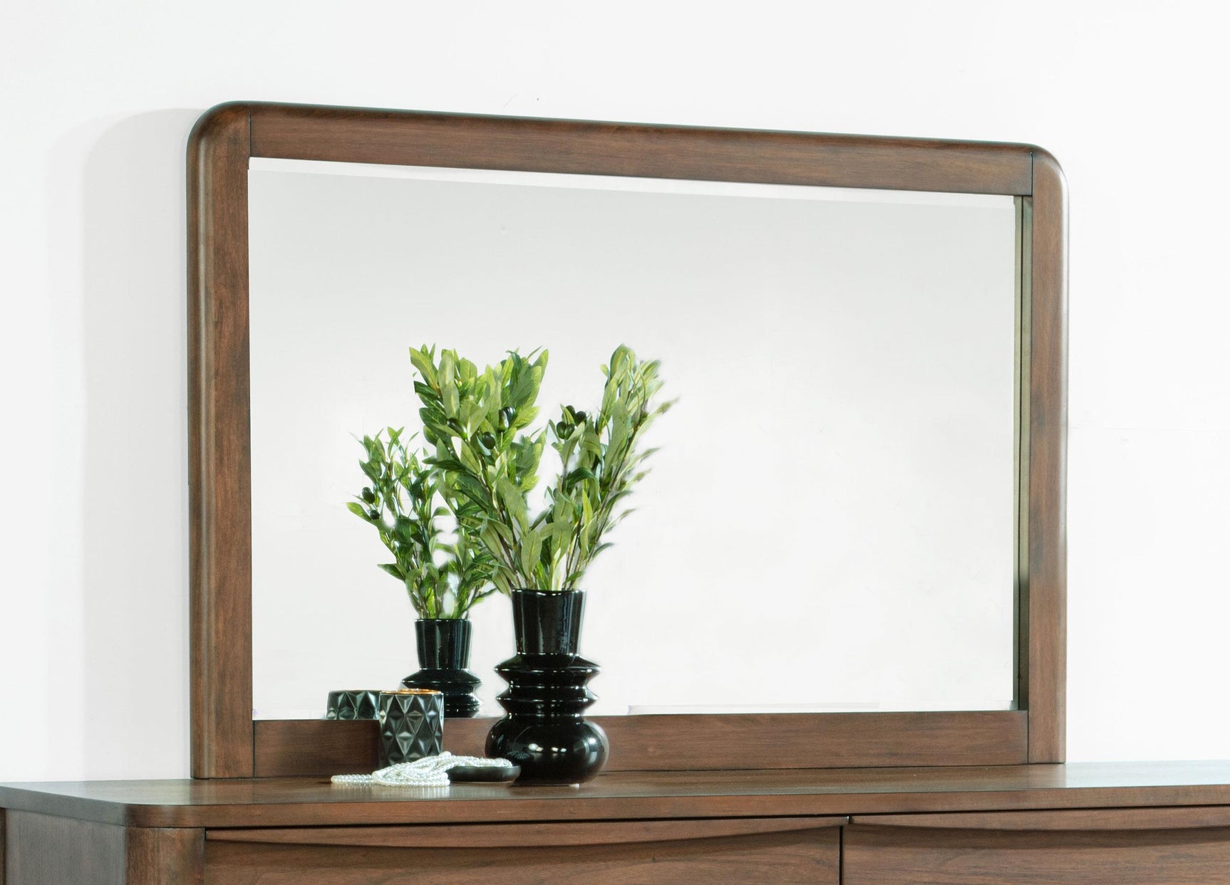 Maderia dresser mirror walnut frame close-up corner