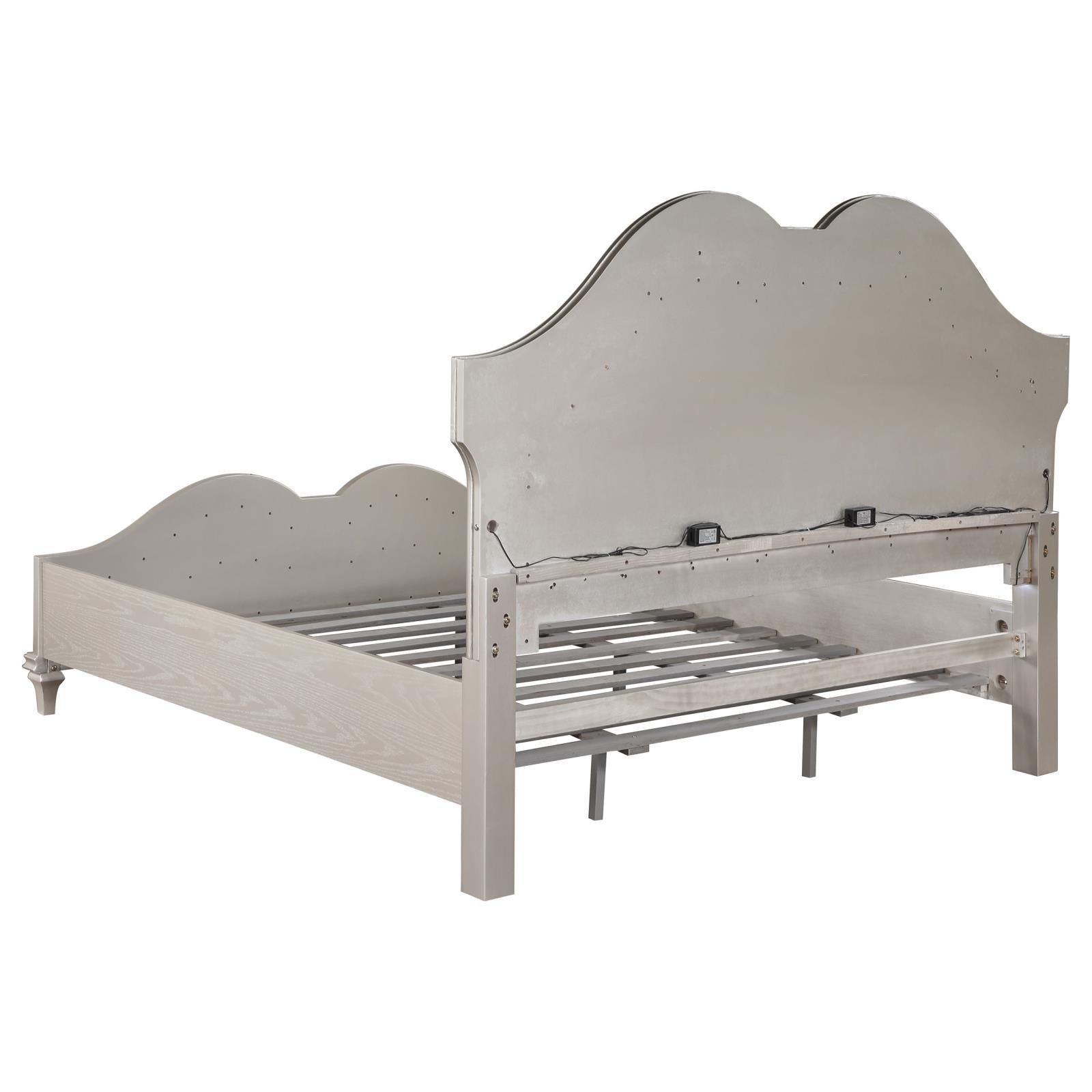 Slender tapered legs and under-bed clearance of Evangeline bed