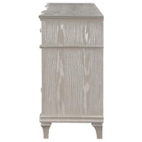 Close-up of curved facade and column panels on dresser front