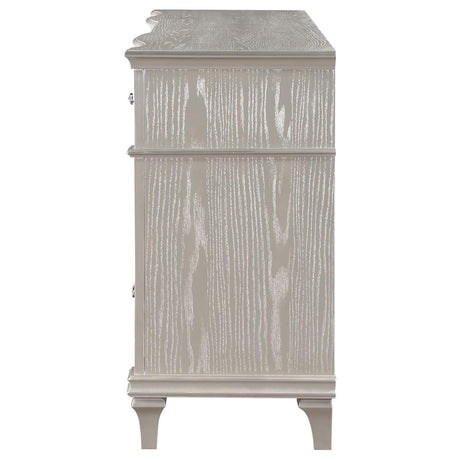 Close-up of curved facade and column panels on dresser front