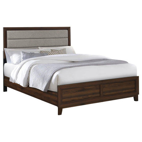 Side angle of Welsley Upholstered Eastern King Bed in walnut