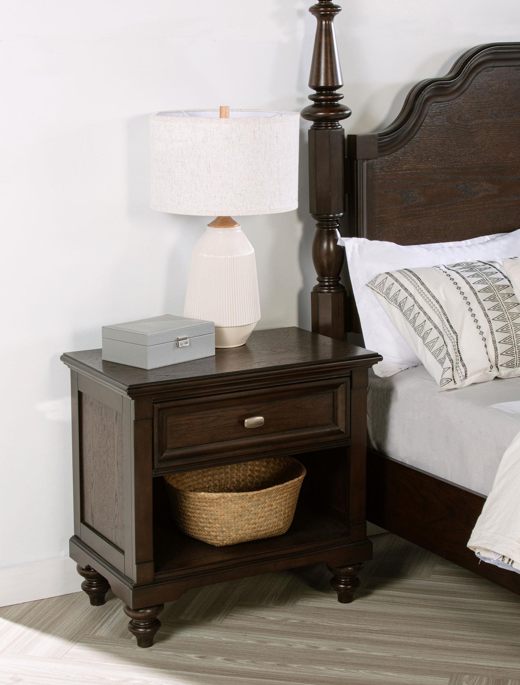 Side angle of Andover dark oak nightstand showing drawer detail