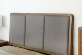 Arini Upholstered Eastern King Panel Bed in Sand Wash and Grey, side view