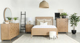 Side angle of Arini Upholstered Eastern King Panel Bed with metal tube legs