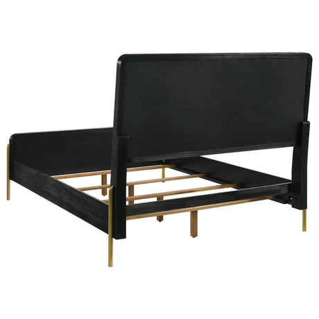 Side profile of Arini queen panel bed showing panel design