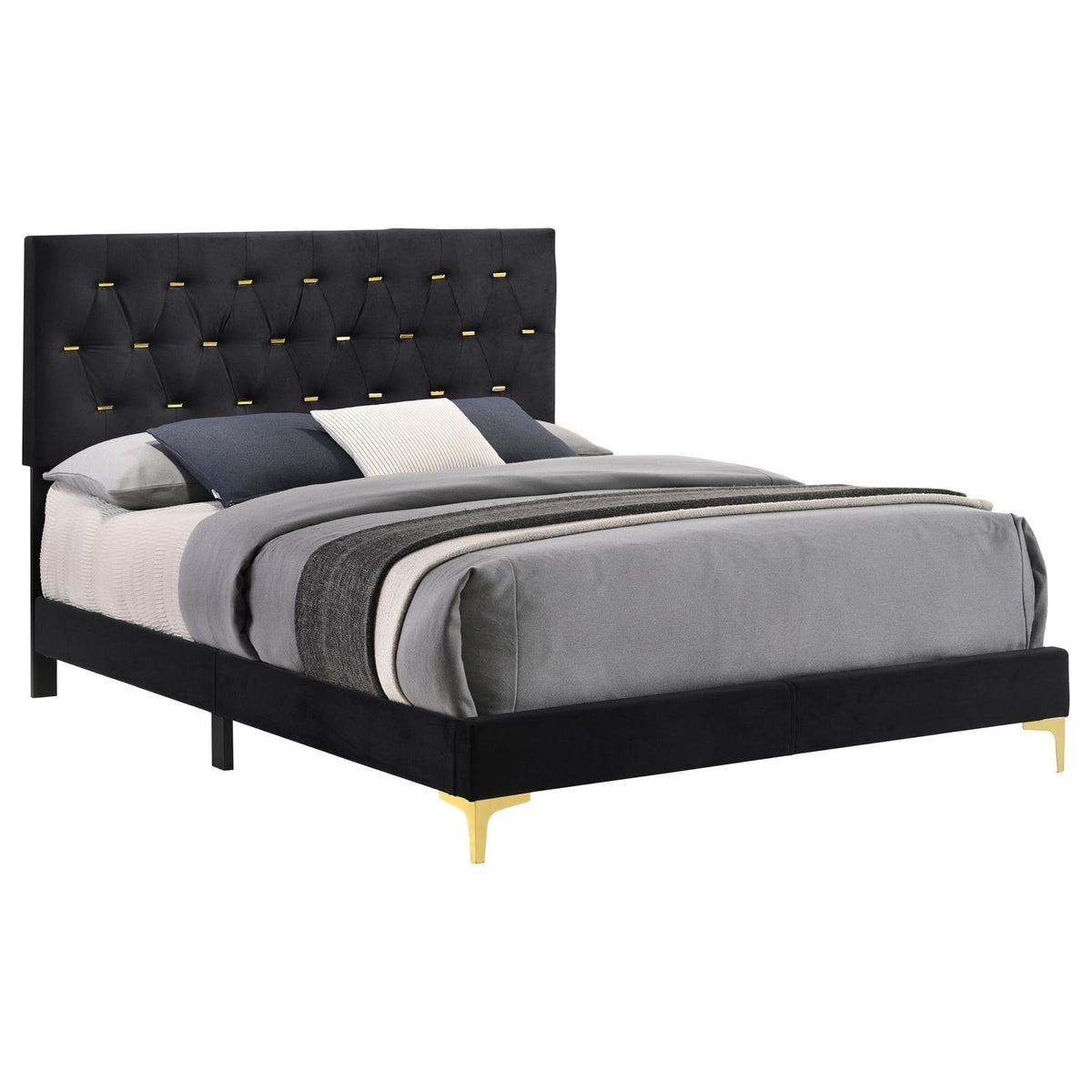 Close-up of diamond tufted headboard with gold bar accents