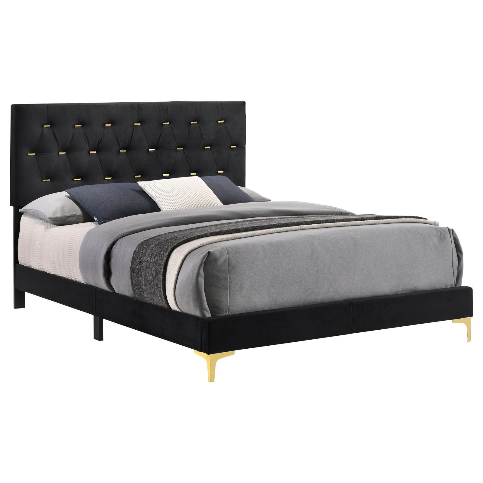 Close-up of diamond tufted headboard with gold bar accents
