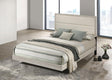 Trenton bed side angle showcasing rustic cream wood frame