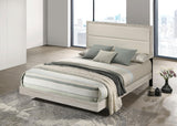 Trenton bed side angle showcasing rustic cream wood frame