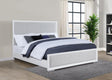 Side angle of Gracemont king panel bed showcasing brushed nickel metal legs