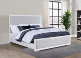 Side angle of Gracemont king panel bed showcasing brushed nickel metal legs