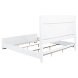 Detail of metal legs with brushed nickel finish supporting panel bed