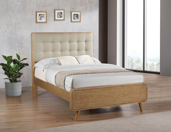Full bed side angle showing tapered legs
